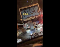 Collab WINY - Two men collect cans in garbage bag