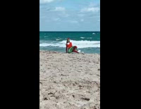 Two daughters then woman elf costume beach