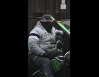 Guy rides black and green atv car  