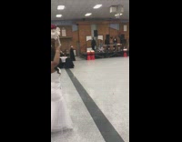 Guy proposes to girl at wedding bride gives her bouquet 