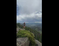 Lady poses sticking out her butt at national park 