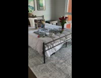 Man Genuinely Smiles at Lady about his Gifts