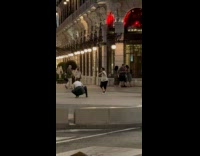 Collab IITW - Man wears visor glasses dances at sidewalk