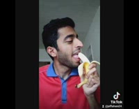 Guy reacts to pizza bite with banana