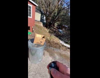 Wood dropped on box over trash can