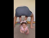 Dad attempts wrestling move on baby girl 