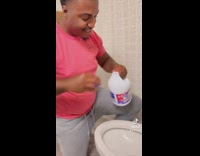 Guy cleans bathroom 