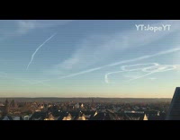 Airplane skywriting in sky shape of penis