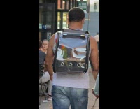 White shirt guy clear backpack two birds 