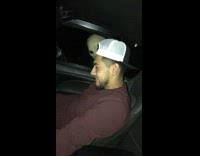 Person in alien mask scares guy in car music 