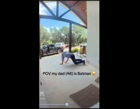 Man falling saves balance by rolling on porch deck