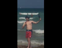 Selfie stick tablet beach old man