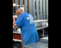 Collab WINY - Man wearing free mustache ride shirt 