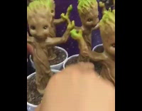 Guy makes all groot toys dance by pressing button