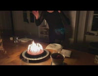 Mother blow birthday magic candles girl scream