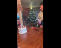 Boy blows trick candles out birthday cake 