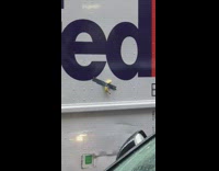 Banana taped onto fedex truck