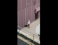 Man white long sleeves tiktok dance in front of wall