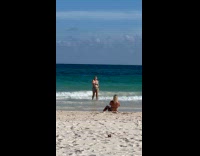 Woman bikini run frolic from beach water