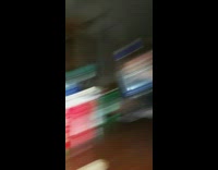 Guy takes a small swig of vodka and friend makes fun of him