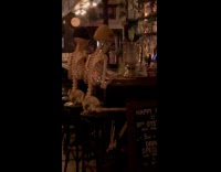 Collab Winy - Four skeletons inside the small bar restaurant