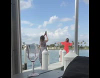 Woman in bright pink dress pier pictures