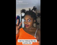 Girl does makeup like Cynthia doll rugrats 