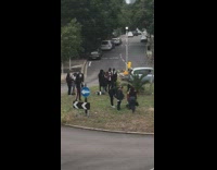 Woman lay down hood black car music video