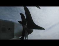 Illusion of detached propellers from plane 