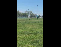 White bucket hat girl dances park alone 