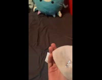 guy makes white face mask for cat sock