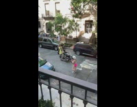 Yellow dress posing middle of street 
