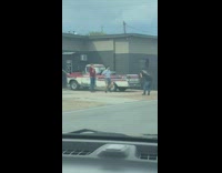 Two men red and blue polo front yard