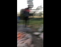 Guys talk about frisbee bonfire tent camping