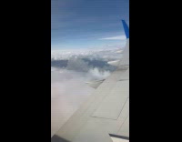 Submitter films cloudy skies from plane ride