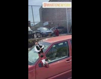 Man in Red Plays Bagpipes Outside Church 