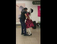 Man dance with skeleton in dress station