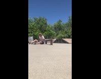 Guy on skateboard falls on rail throws board