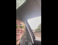 Pennywise the clown on a motorcycle on the freeway