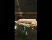 Giant inflatable penis on wet ground