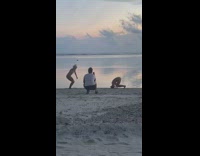 two girls handstands move legs sunset