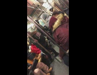 Red jacket girl eats corn on subway 