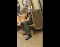 Long hair guy shaves arm hair blade