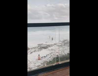 Men Take Turns as Take Pictures of One Another