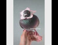 Pigeon bird pink paper flower around neck 
