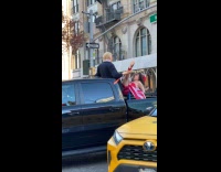 Car drives with Trump statue on trunk