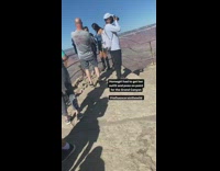 Black leather skirt girl poses grand canyon 