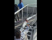 Girl grey sweater dance tiktok boat deck