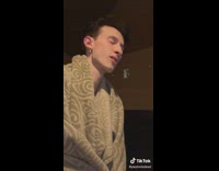 Guy tells girl dancing something is going to fall out 