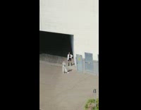 Girl white jacket pose parking garage entrance